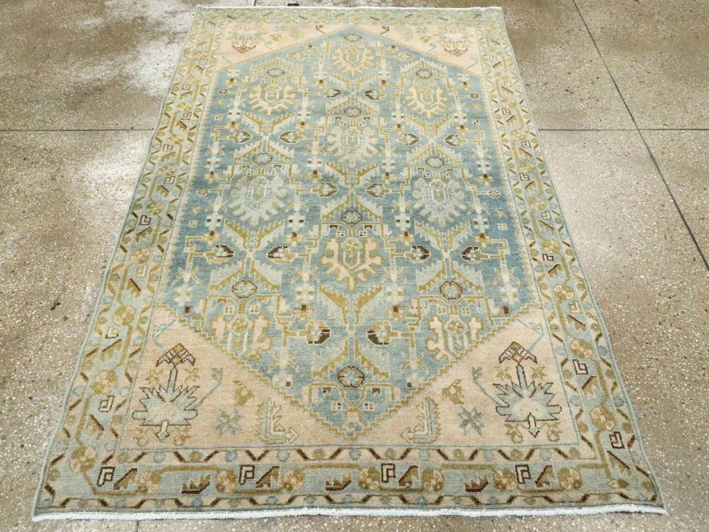 A vintage Persian Malayer accent rug handmade during the Mid-20th century.

Measures: 4' 4