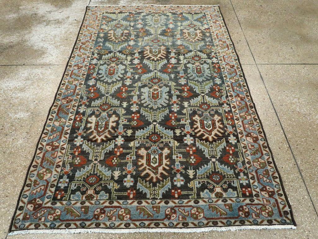 A vintage Persian Malayer accent rug handmade during the Mid-20th century.

Measures: 4' 4