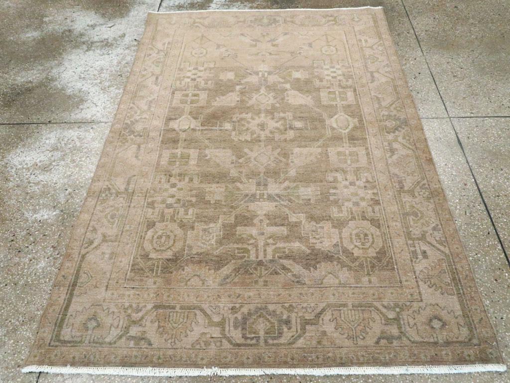 Four squares and four nested octagons decorate the abrashed rust field along with color sampler rosettes, diagonal boteh-leaves, and a central small, rayed diamond. Characteristic straw border with angular smooth tendril sprouting reversing lappet –