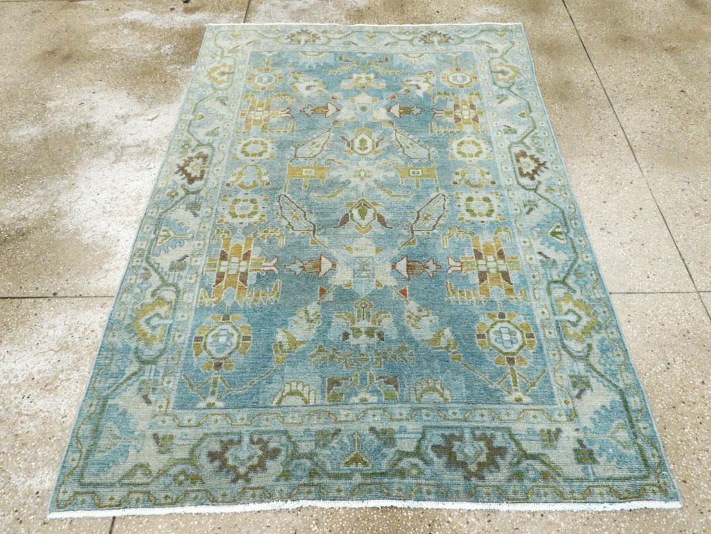 A vintage Persian Malayer accent rug handmade during the Mid-20th century.

Measures: 4' 5