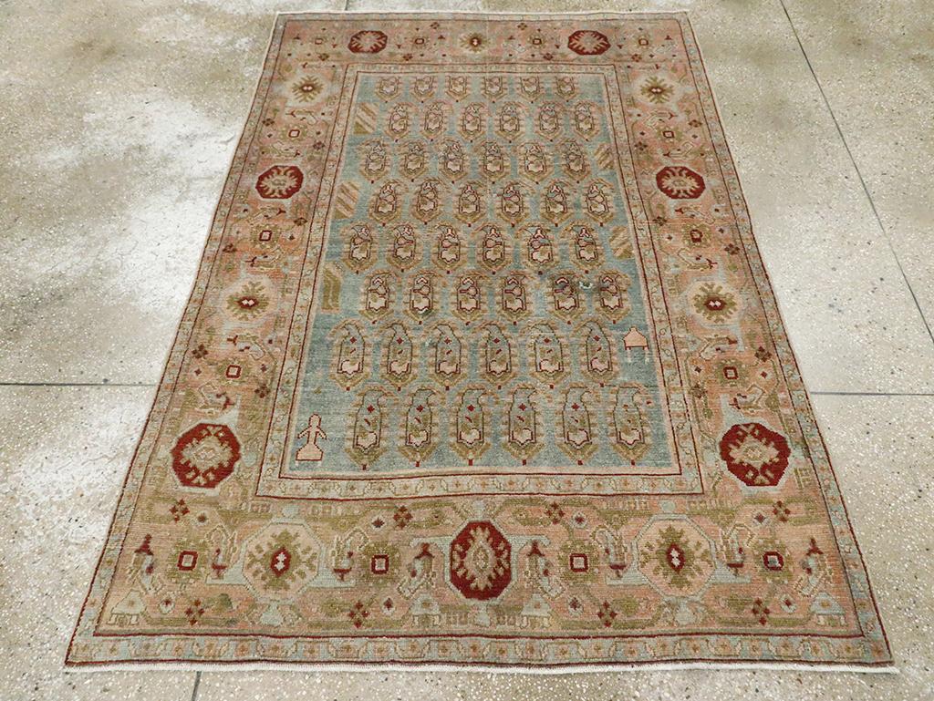A vintage Persian Malayer accent rug handmade during the Mid-20th century.

Measures: 4' 5
