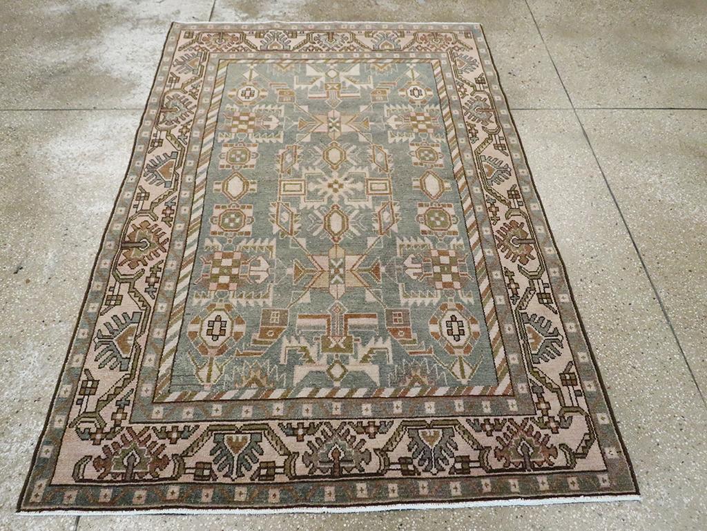 A vintage Persian Malayer accent rug handmade during the Mid-20th century.

Measures: 4' 5