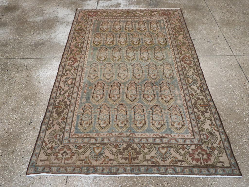 A vintage Persian Malayer accent rug handmade during the Mid-20th century.

Measures: 4' 5