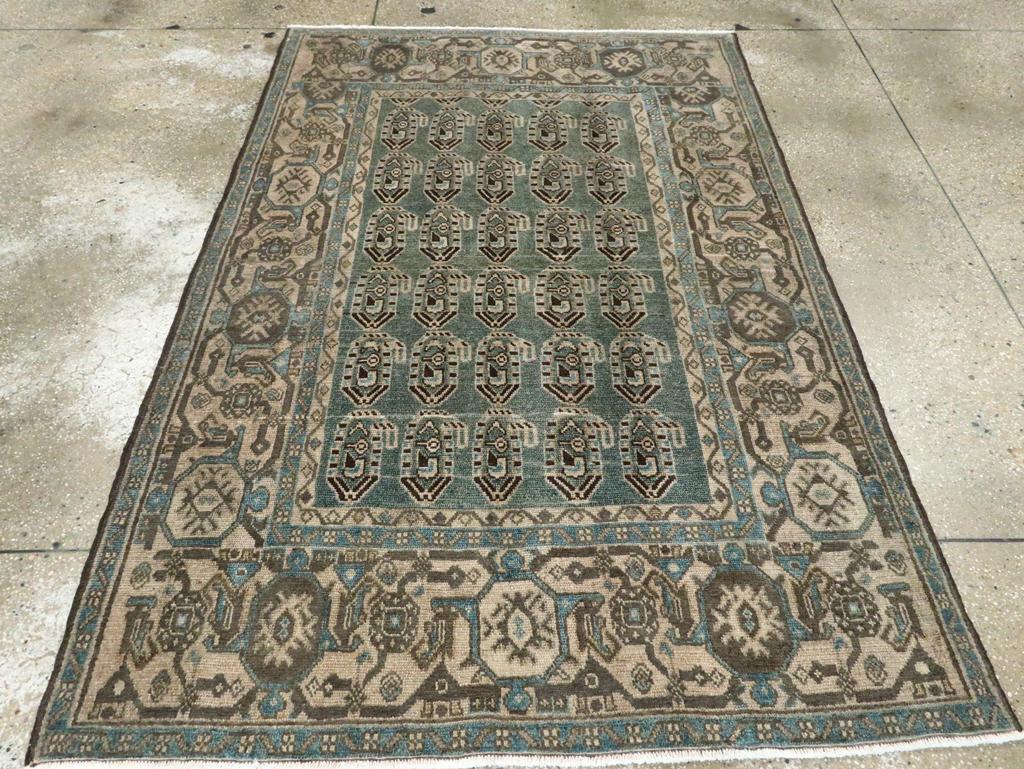 A vintage Persian Malayer accent rug handmade during the Mid-20th century.

Measures: 4' 5