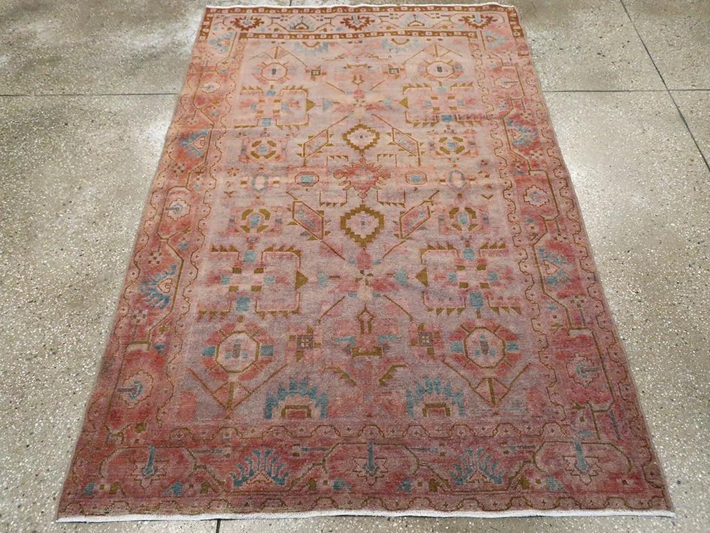 A vintage Persian Malayer accent rug handmade during the Mid-20th century.

Measures: 4' 5