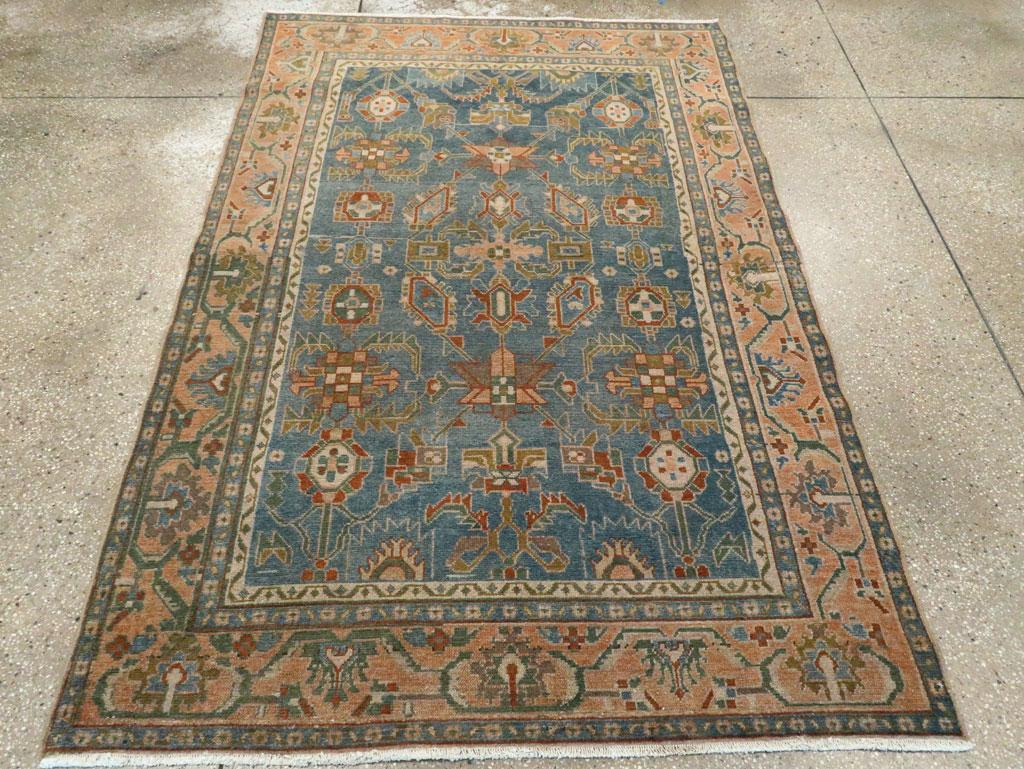 A vintage Persian Malayer accent rug handmade during the Mid-20th century.

Measures: 4' 5
