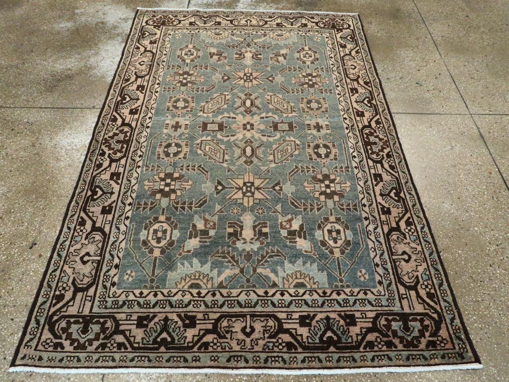 A vintage Persian Malayer accent rug handmade during the Mid-20th century.

Measures: 4' 5