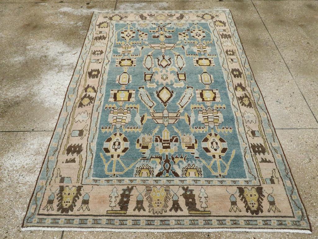 A vintage Persian Malayer accent rug handmade during the Mid-20th century.

Measures: 4' 5