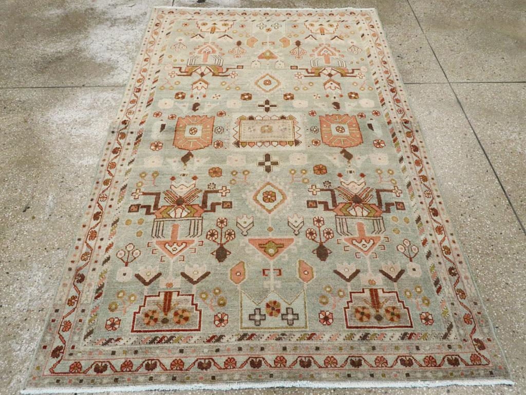 A vintage Persian Malayer accent rug handmade during the Mid-20th century.

Measures: 4' 5