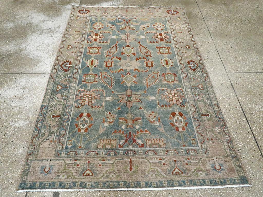 A vintage Persian Malayer accent rug handmade during the Mid-20th century.

Measures: 4' 5