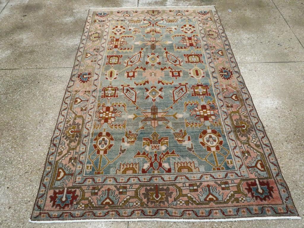 A vintage Persian Malayer accent rug handmade during the Mid-20th century.

Measures: 4' 5