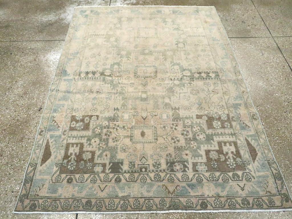 The well-abrashed brown field is nearly covered by three Afshar-style fringed and stepped broad medallions with half medallions closely pressing in from the sides. Main border of flattened triangular fringed palmettes. Medium-moderate