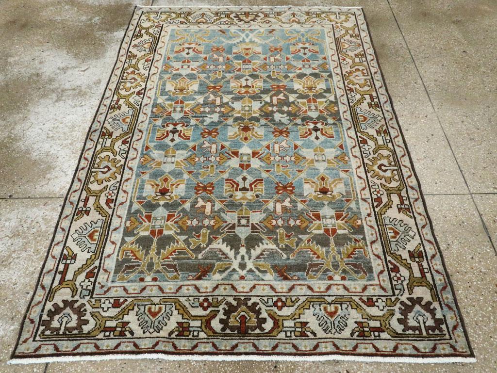 A vintage Persian Malayer accent rug handmade during the Mid-20th century.

Measures: 4' 6