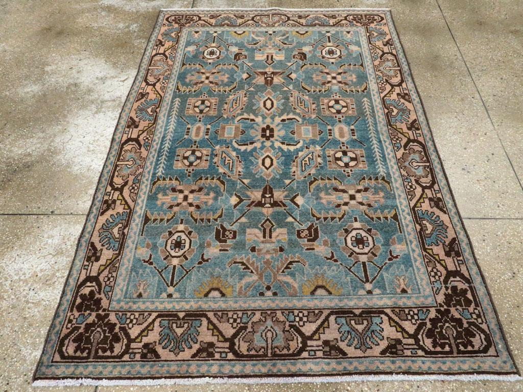 A vintage Persian Malayer accent rug handmade during the Mid-20th century.

Measures: 4' 6