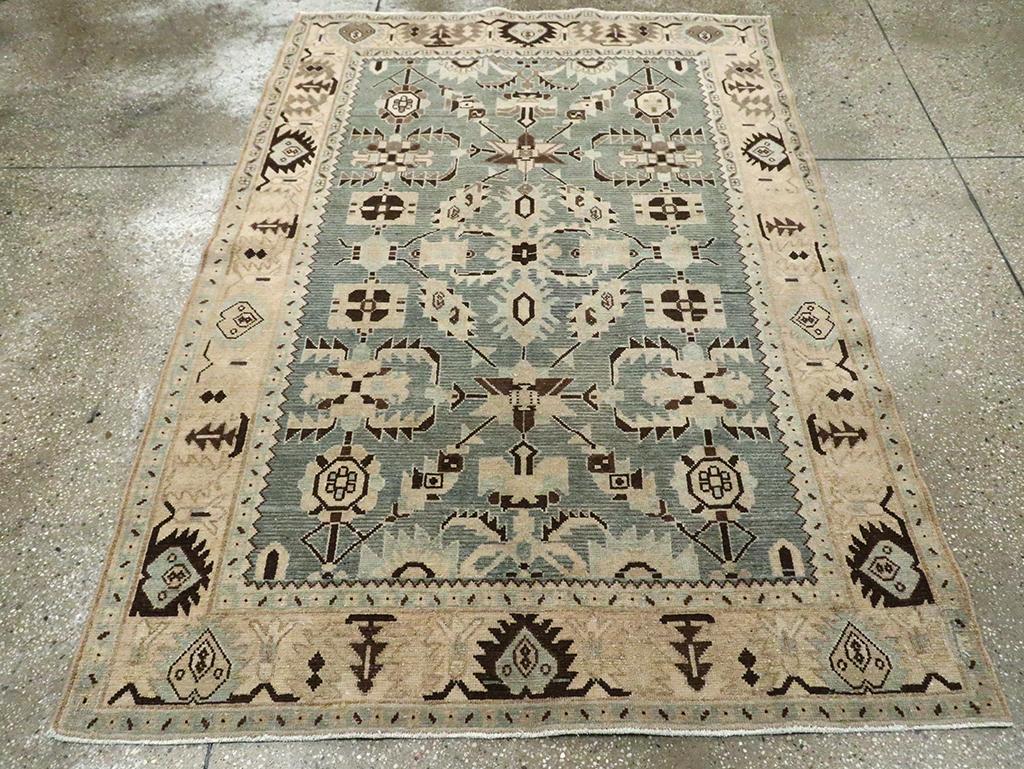 A vintage Persian Malayer accent rug handmade during the Mid-20th century.

Measures: 4' 6