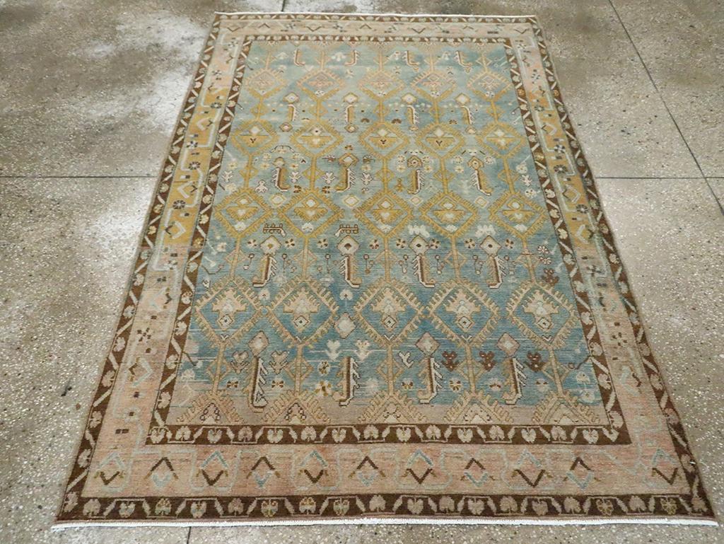 A vintage Persian Malayer accent rug handmade during the Mid-20th century.

Measures: 4' 6