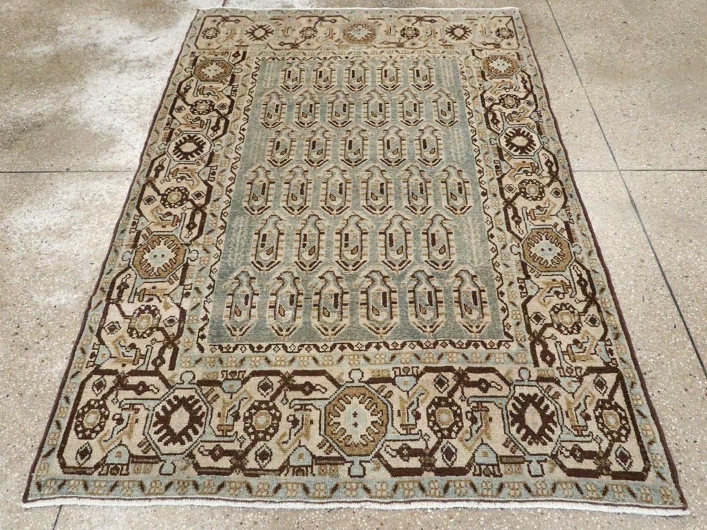 A vintage Persian Malayer accent rug handmade during the Mid-20th century.

Measures: 4' 6