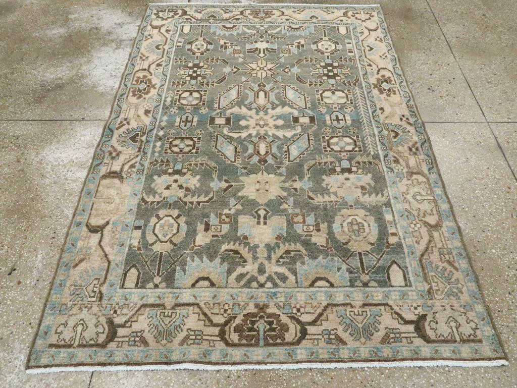 A vintage Persian Malayer accent rug handmade during the Mid-20th century.

Measures: 4' 6