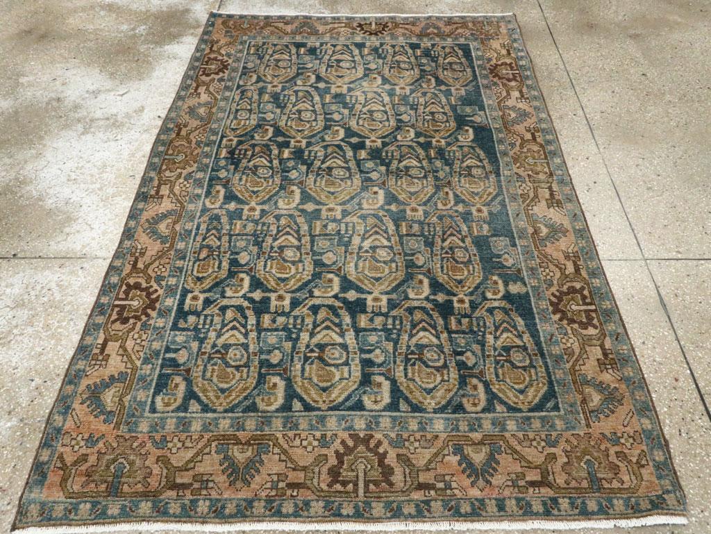 A vintage Persian Malayer accent rug handmade during the Mid-20th century.

Measures: 4' 6