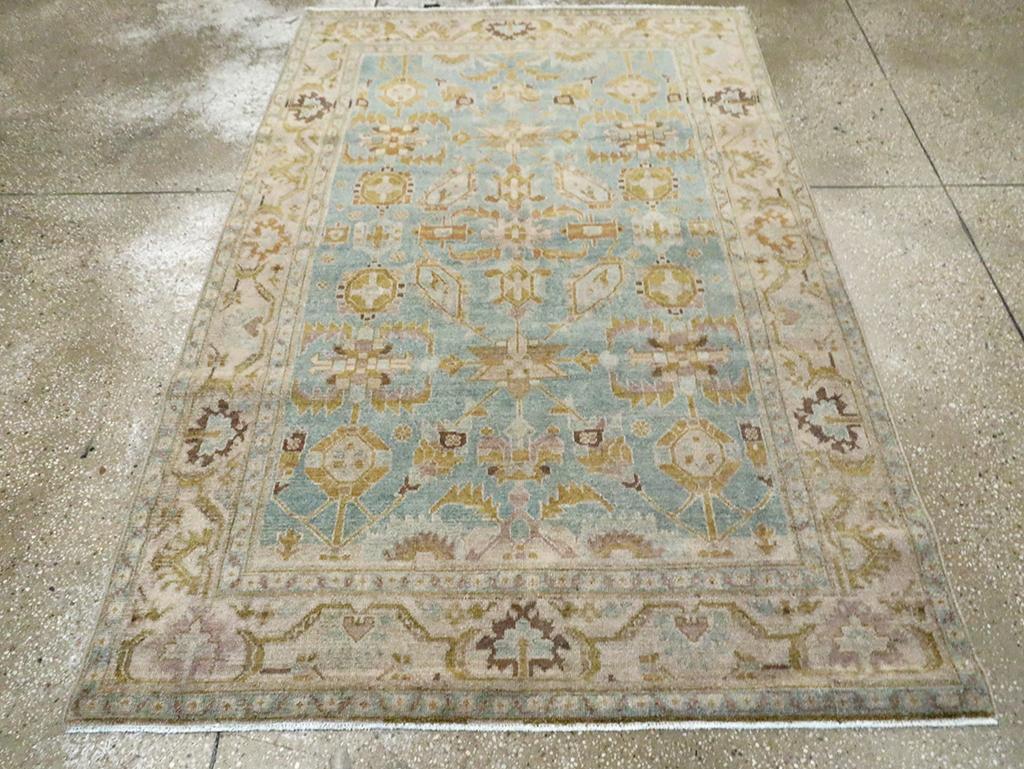 A vintage Persian Malayer accent rug handmade during the Mid-20th century.

Measures: 4' 6