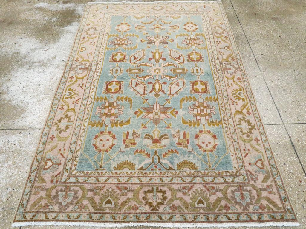 A vintage Persian Malayer accent rug handmade during the Mid-20th century.

Measures: 4' 6