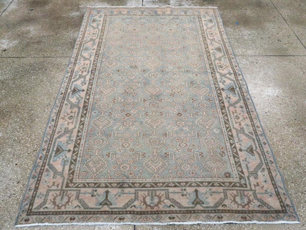 A vintage Persian Malayer accent rug handmade during the Mid-20th century.

Measures: 4' 6