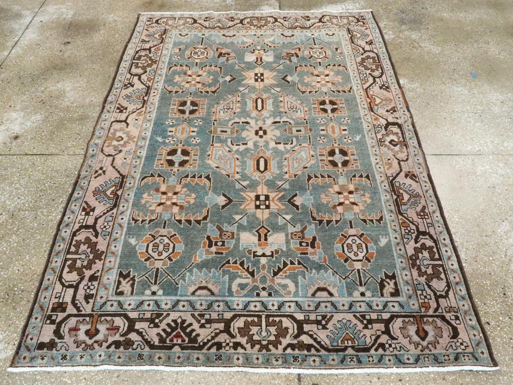 A vintage Persian Malayer accent rug handmade during the Mid-20th century.

Measures: 4' 7