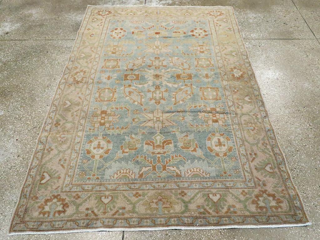 A vintage Persian Malayer accent rug handmade during the Mid-20th century.

Measures: 4' 7