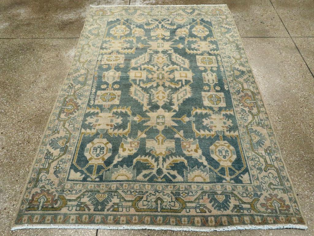 A vintage Persian Malayer accent rug handmade during the Mid-20th century.

Measures: 4' 7