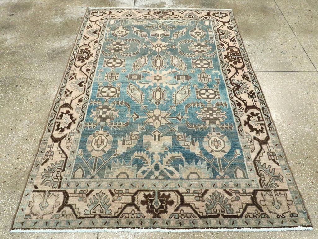 A vintage Persian Malayer accent rug handmade during the Mid-20th century.

Measures: 4' 7