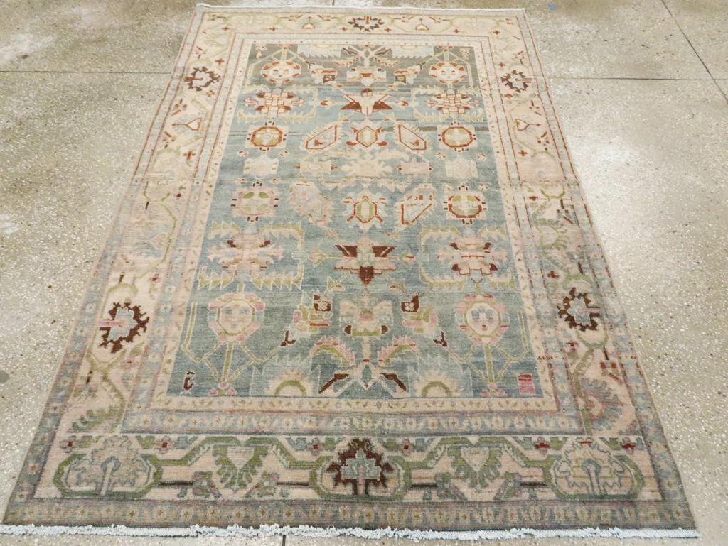 A vintage Persian Malayer accent rug handmade during the Mid-20th century.

Measures: 4' 7