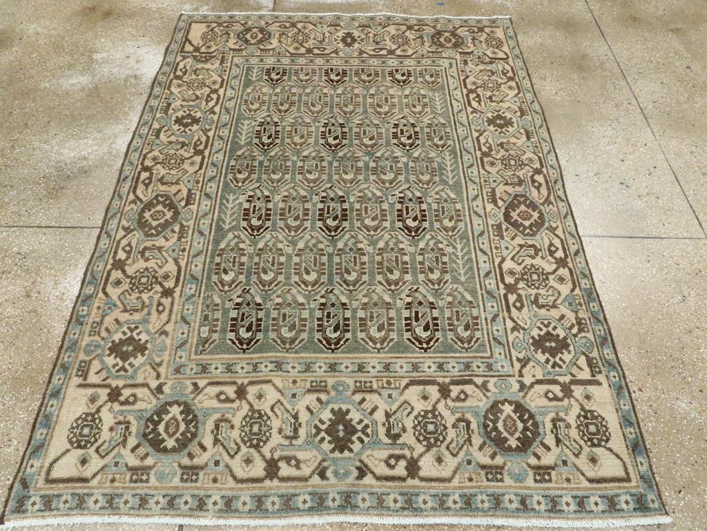 A vintage Persian Malayer accent rug handmade during the Mid-20th century.

Measures: 4' 8
