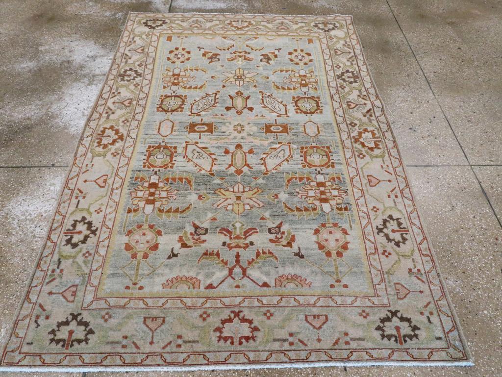 A vintage Persian Malayer accent rug handmade during the Mid-20th century.

Measures: 4' 8