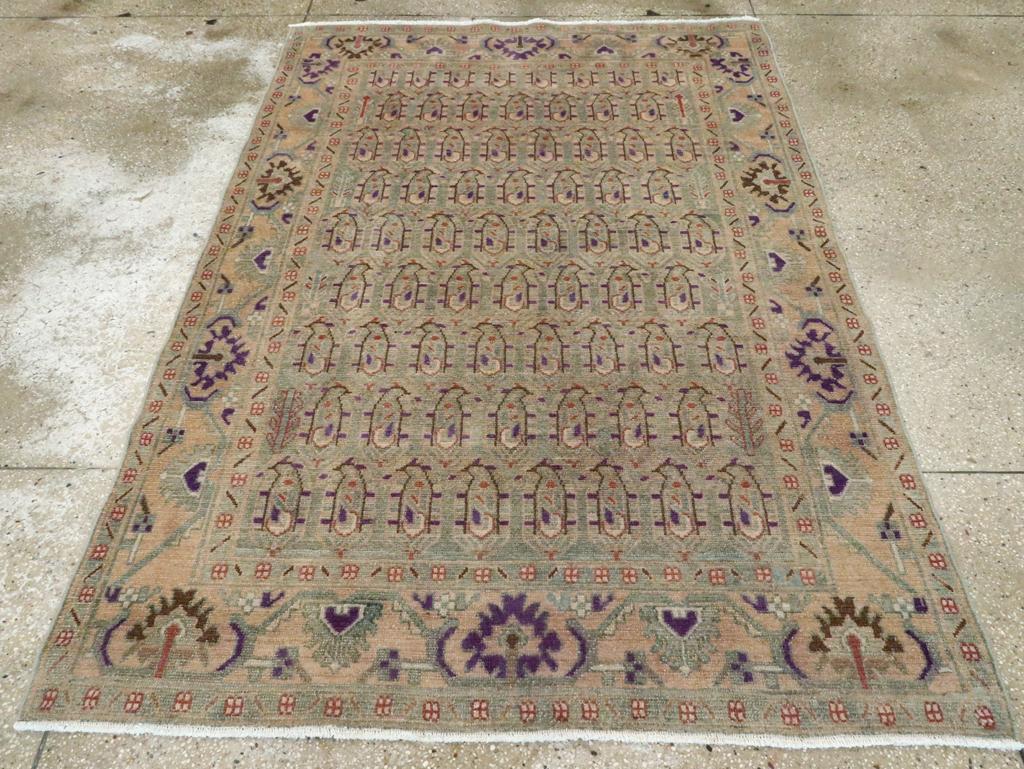 A vintage Persian Malayer accent rug handmade during the Mid-20th century.

Measures: 4' 10