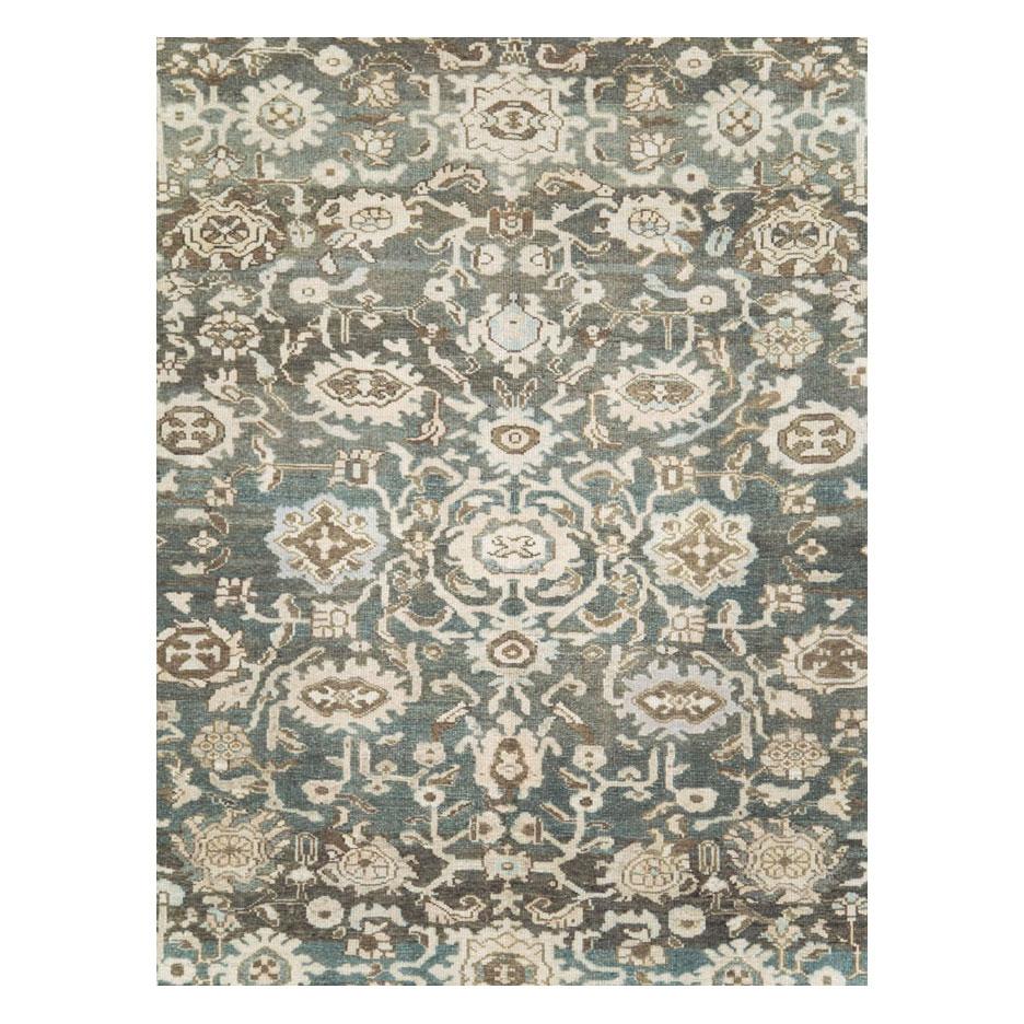 A vintage Persian Malayer rustic room size rug handmade during the mid-20th century with a khaki green and slate field, and a pale light purple border.

Measures: 10' 4