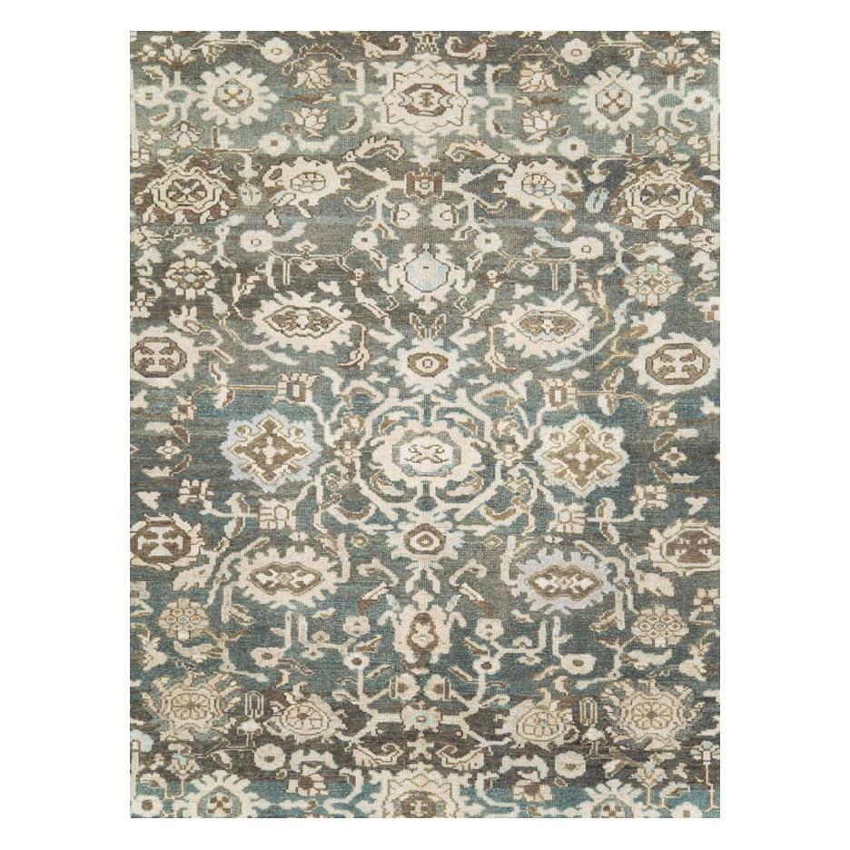 Un tapis vintage Persan Malayer rustique de taille pièce fait à la main au milieu du 20ème siècle avec un champ vert kaki et ardoise, et une bordure violet clair pâle.

Mesures : 10' 4