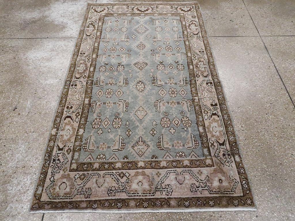 A vintage Persian Malayer throw rug handmade during the Mid-20th century.

Measures: 3' 7