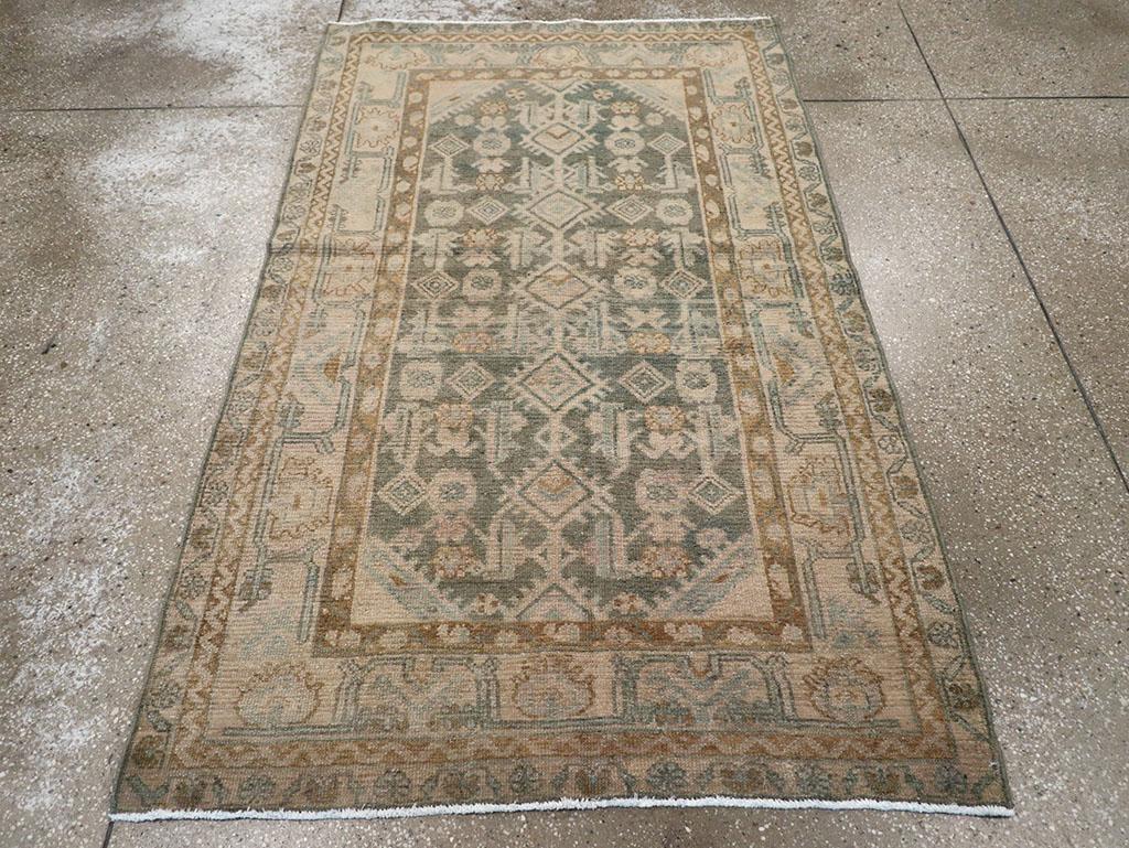 A vintage Persian Malayer throw rug handmade during the Mid-20th century.

Measures: 3' 8