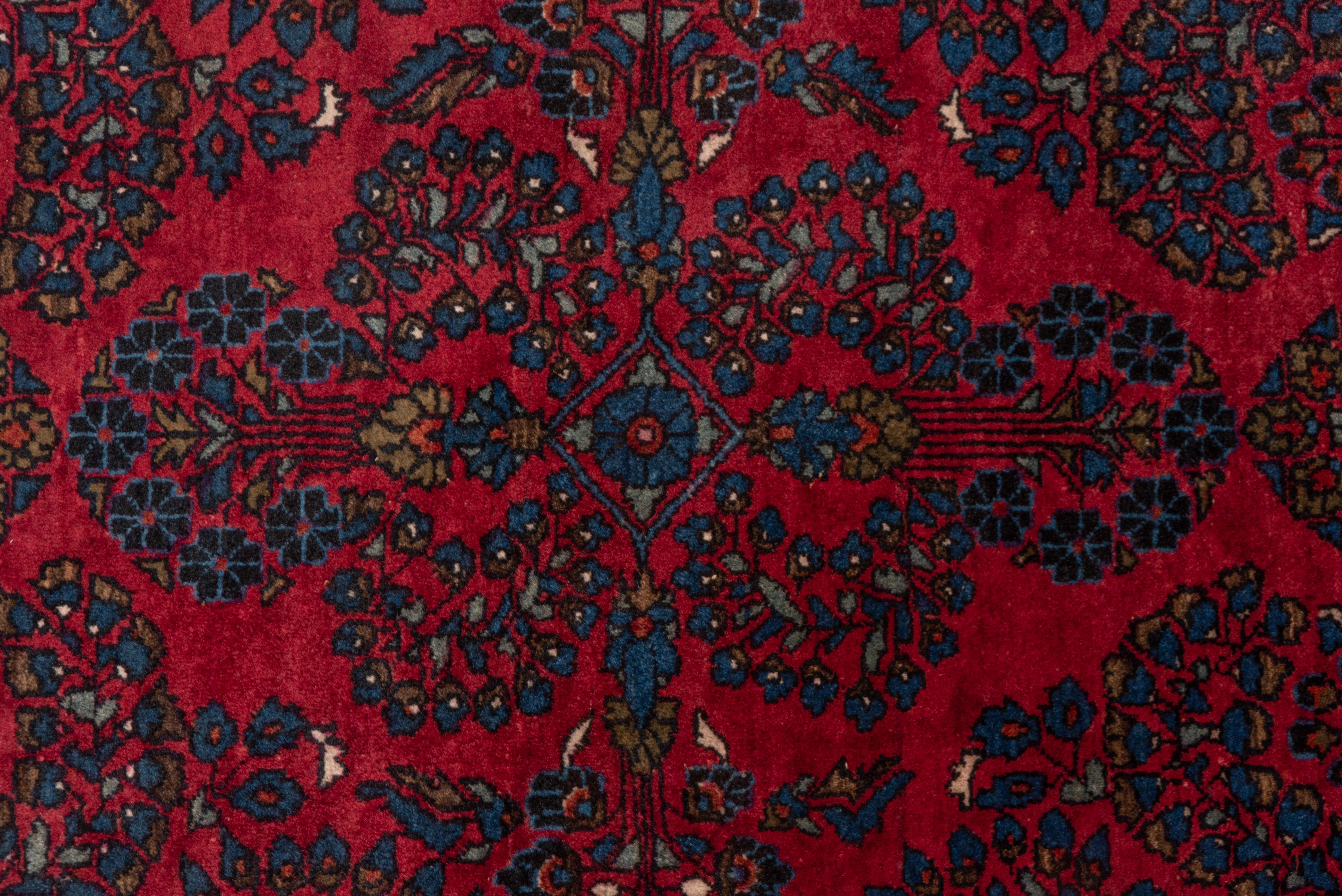 Hand-Knotted Mid-20th Century Persian Sarouk Rug, Red Field, Medium Pile, Blue Acents For Sale