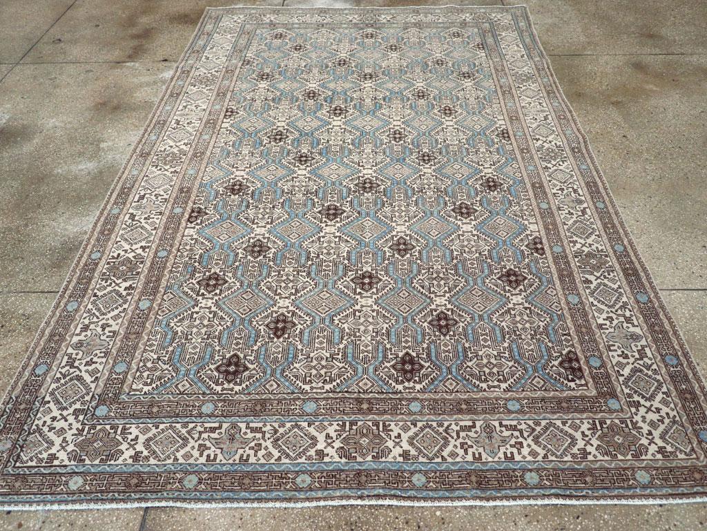A vintage Persian Tabriz accent carpet handmade during the Mid-20th century.

Measures: 6' 10