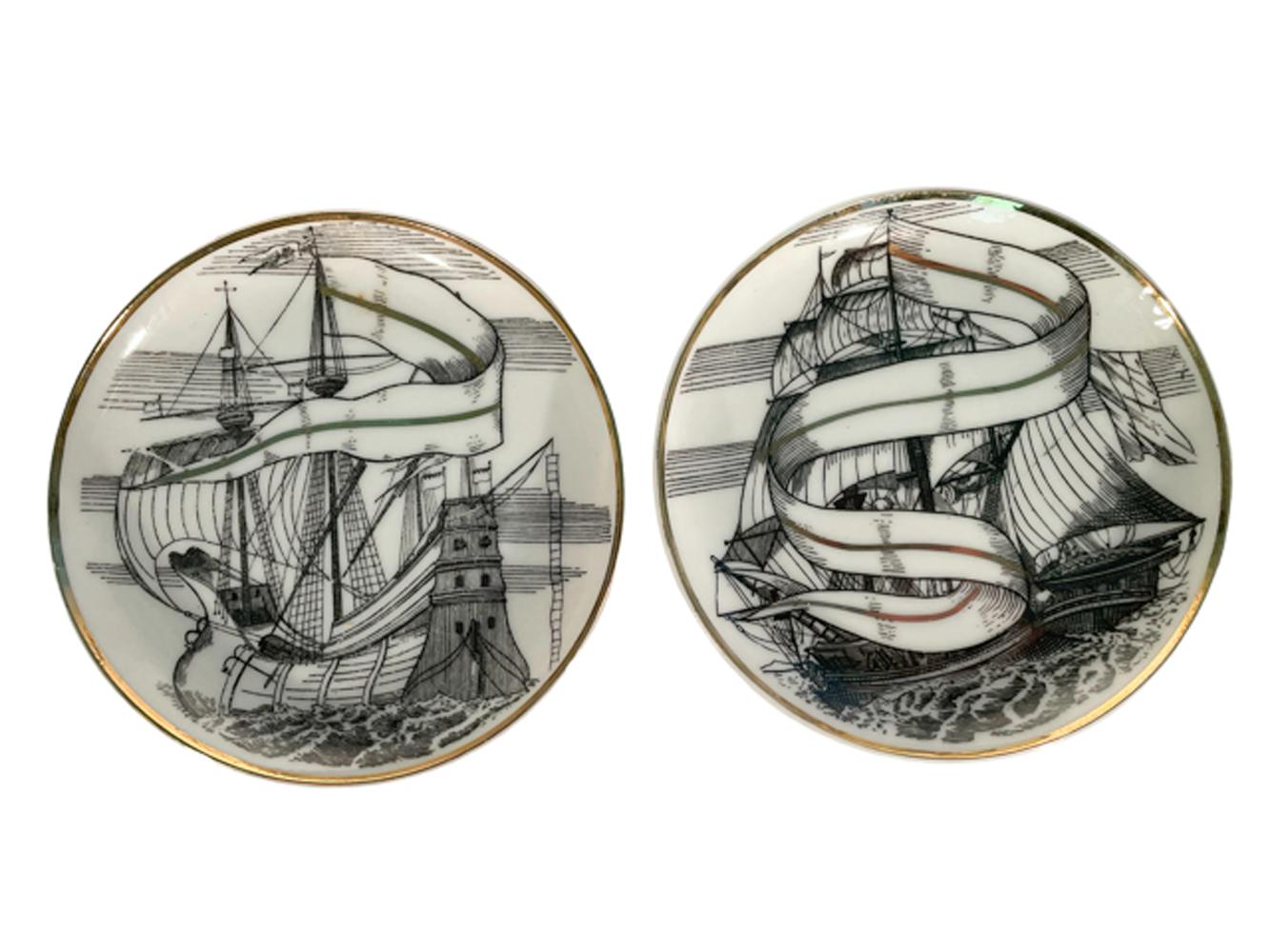Set of six porcelain drinks coasters each with a different sailing ship in black with gold details in their original box marked 
