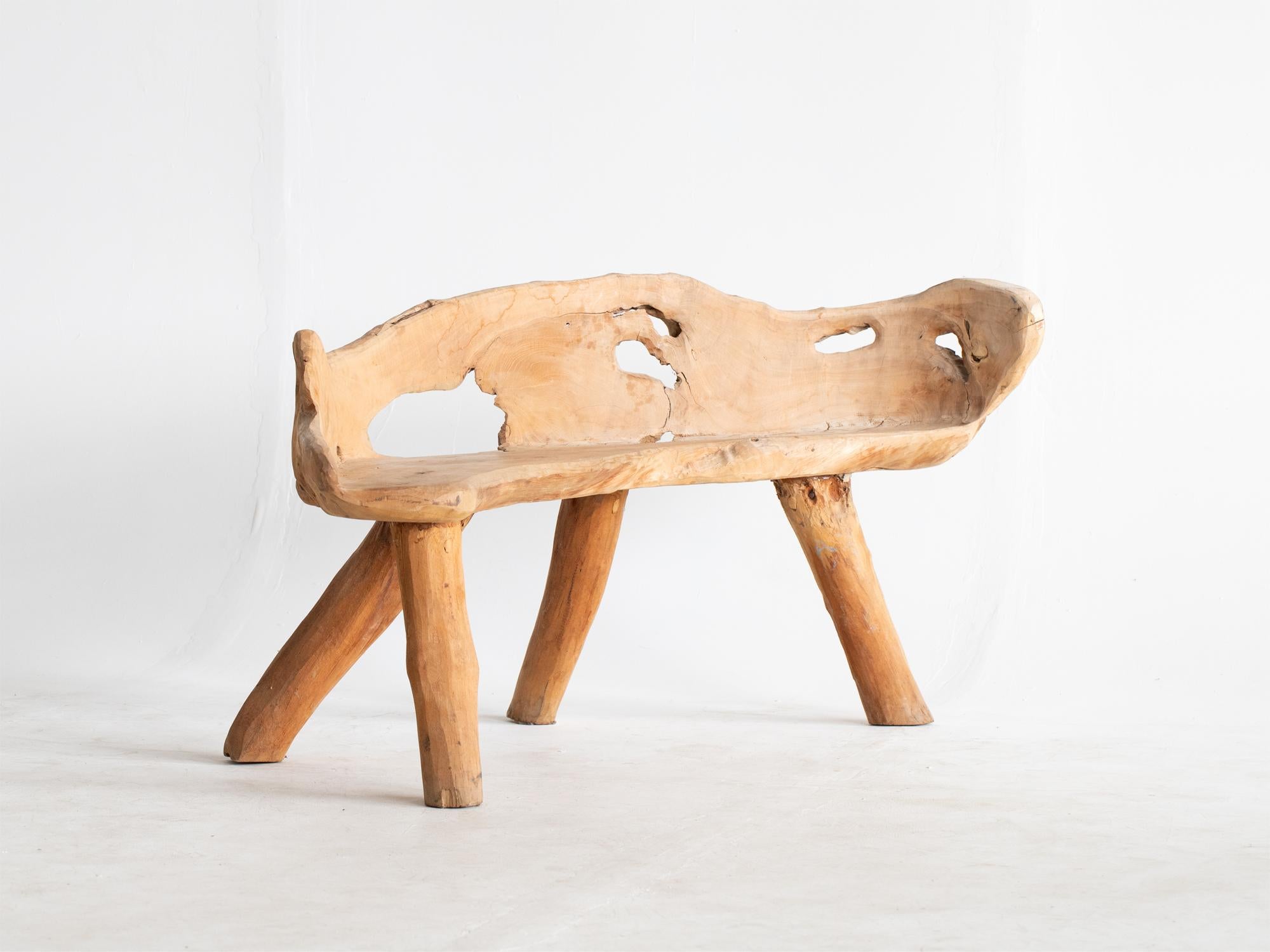 A primitive teak root bench, mid 20C.

In good sturdy order. Also suitable for interior use.

63.5 x 132 x 50 cm (25 x 52.0 x 19.7 