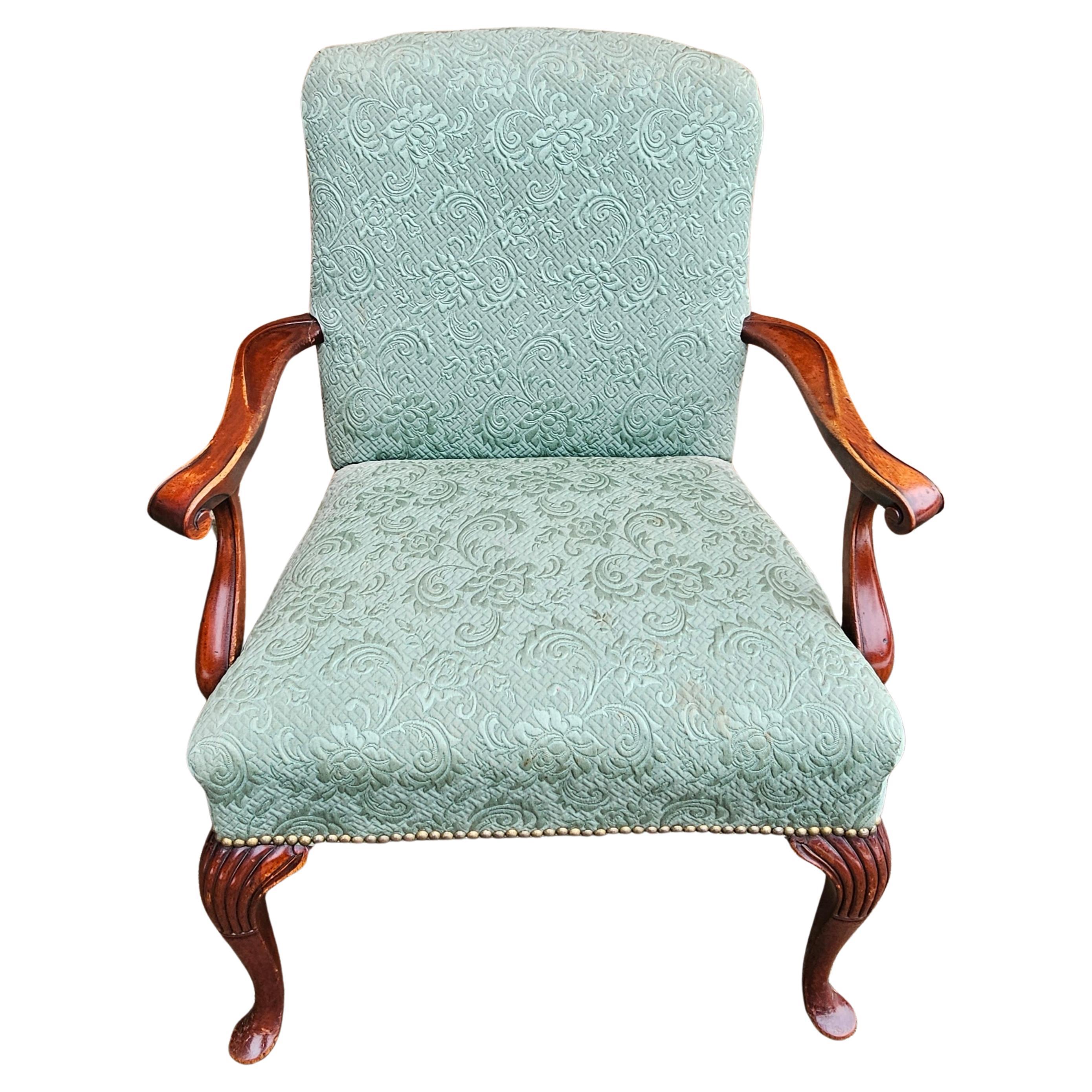 A Mid 20th Century Queen Anne Style Mahogany Upholstered Armchair. Very good vintage condition. Solid upholstery with nail trim line. Measures 28