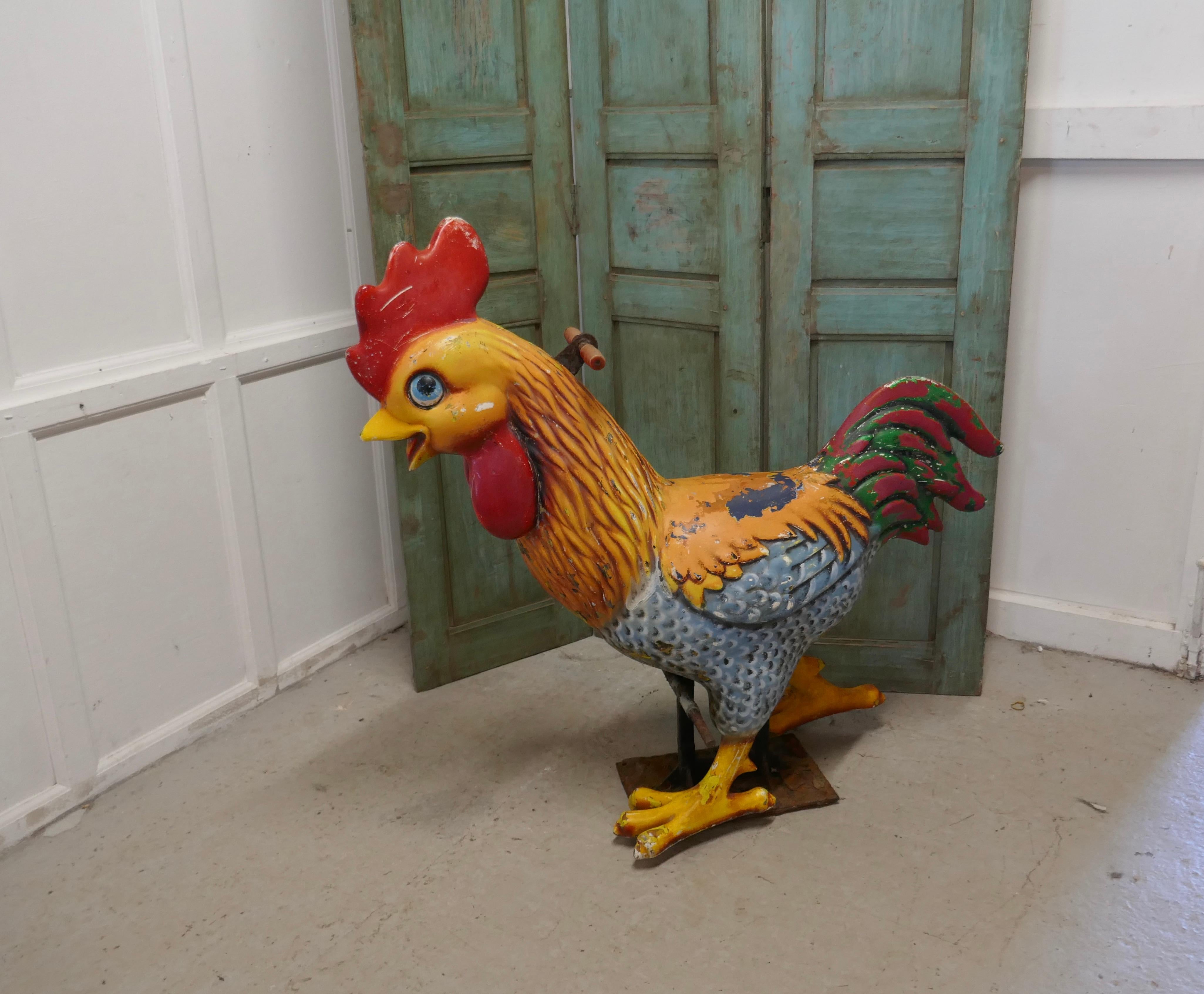 Mid-20th century quirky fair ground carousel giant funky chicken ride

A large quirky fair ground character a great fun piece, our Giant Rooster has been set on an purpose made Iron base so he can be sat upon, he has handles and foot rests which