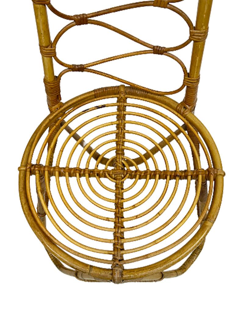 Mid-20th Century rattan and bamboo set of a chair and a magazine rack In Good Condition For Sale In Delft, NL