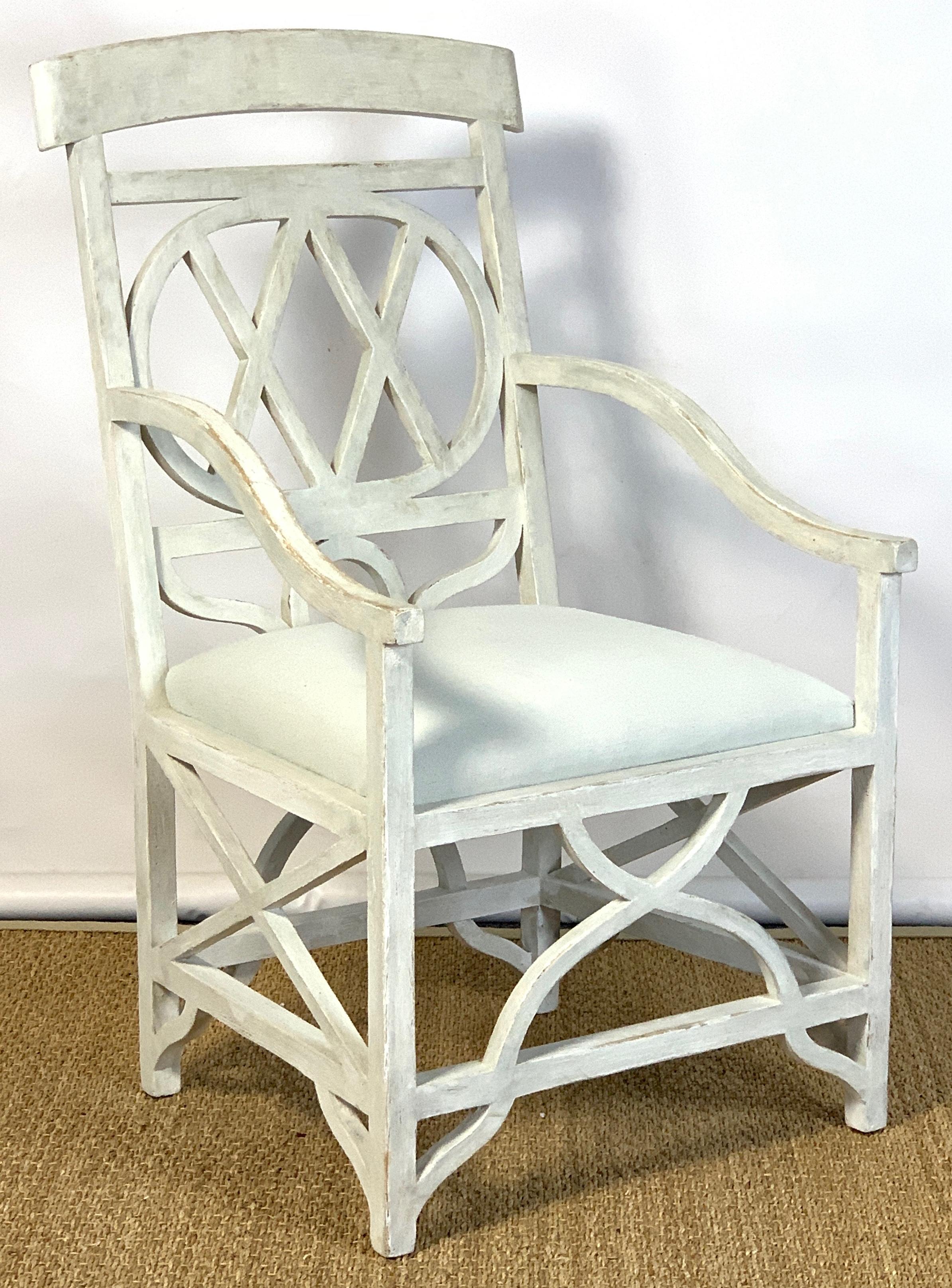 A very stylish and unusual, mid-20th century. Armchair custom painted in a distressed soft white finish. Appears to be built of solid white oak.