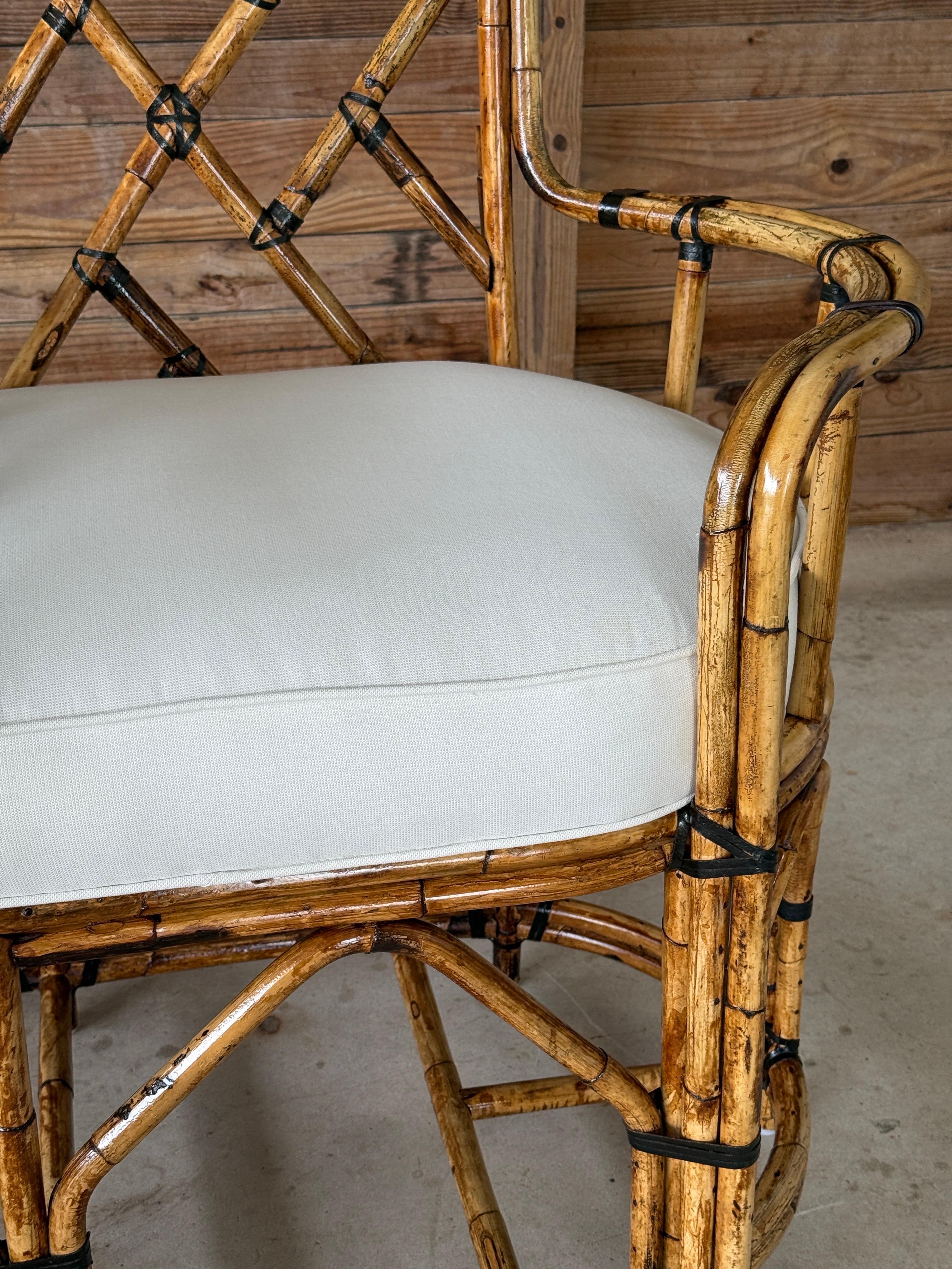 British Colonial Mid-20th Century Restored Rattan Settee With Built-in Side Table and New Custom For Sale