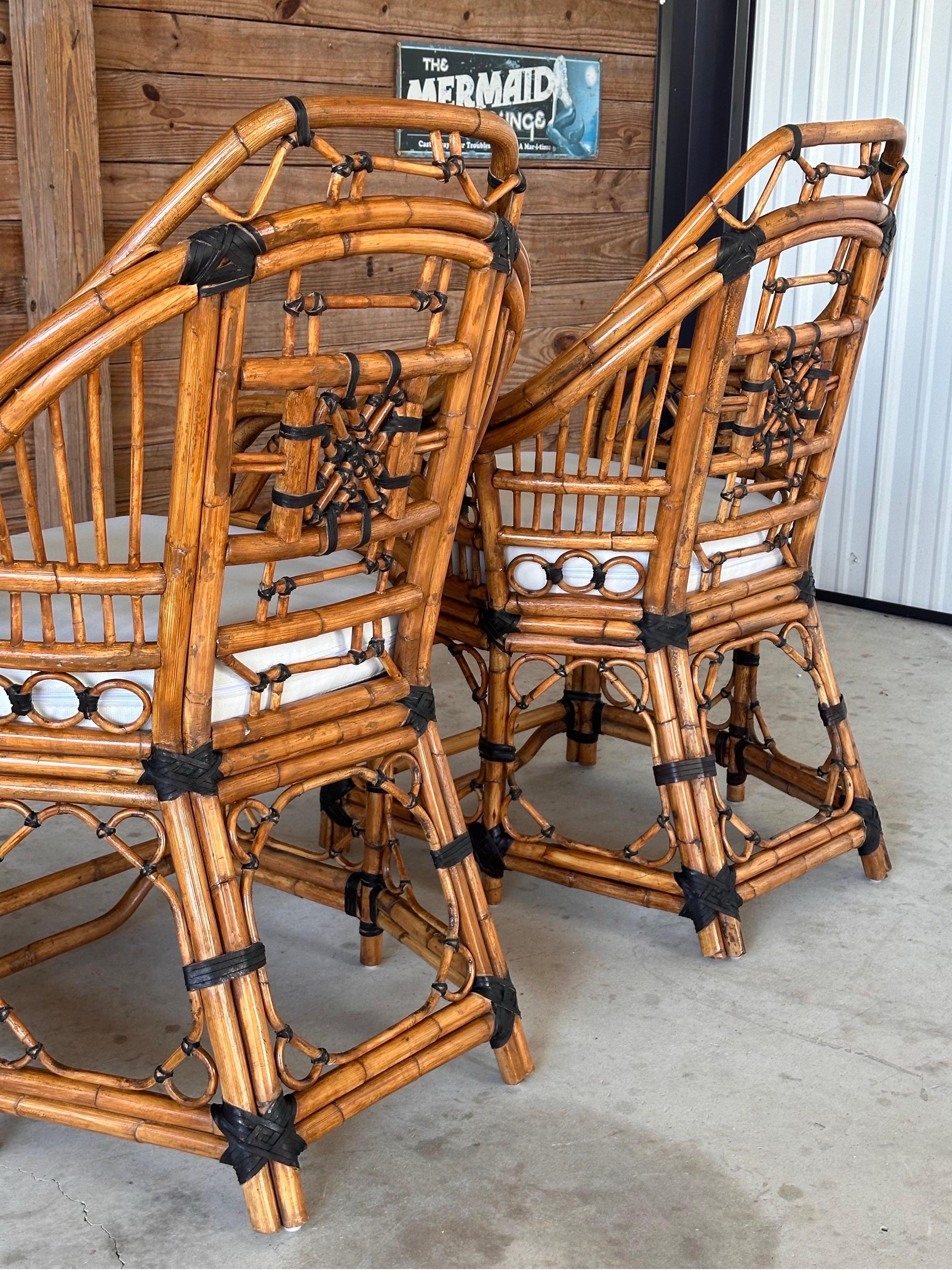 Caning Mid-20th Century Restored Upholstered Rattan Fretwork Chippendale Side Chairs