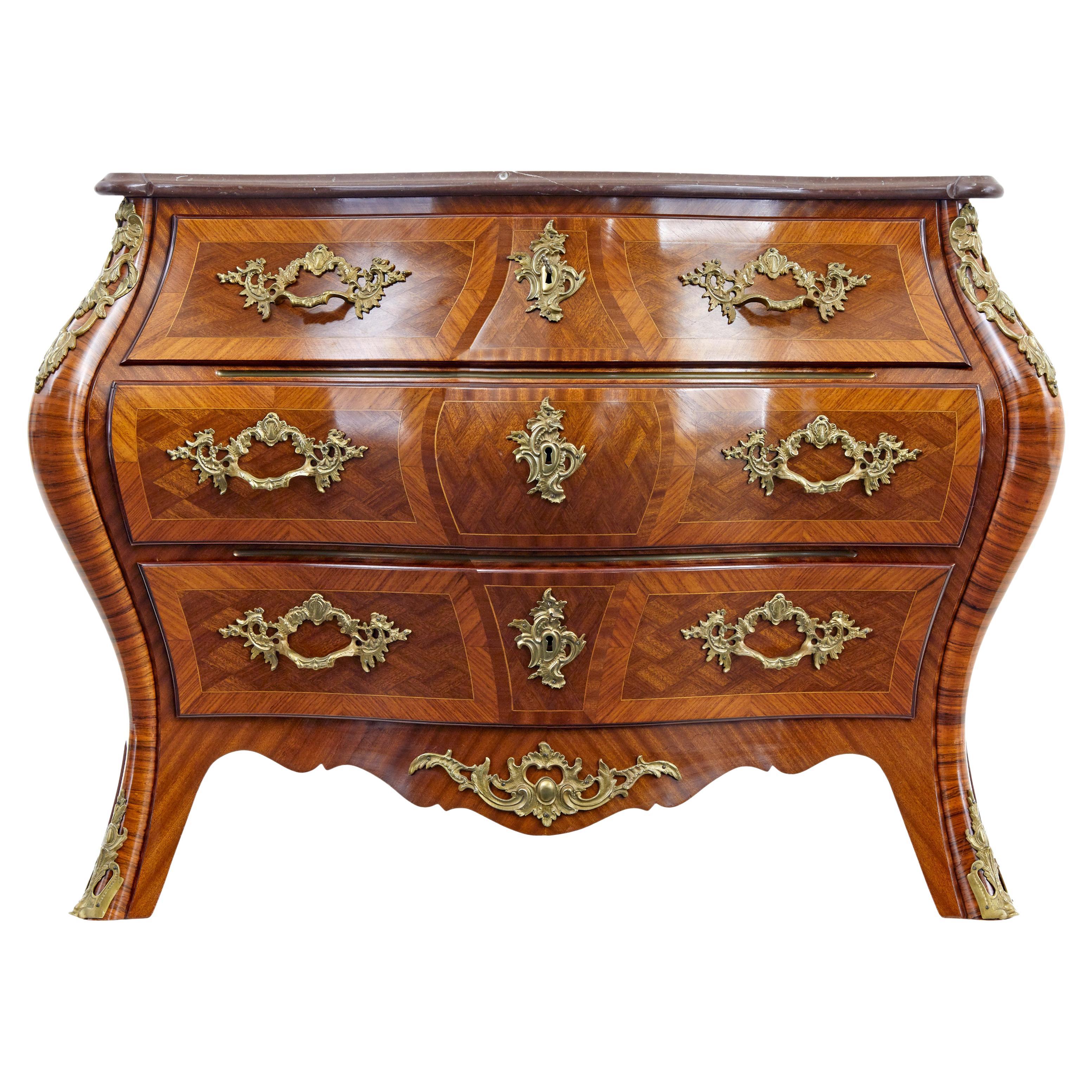Mid 20th century rococo revival bombe kingwood mahogany chest of drawers For Sale
