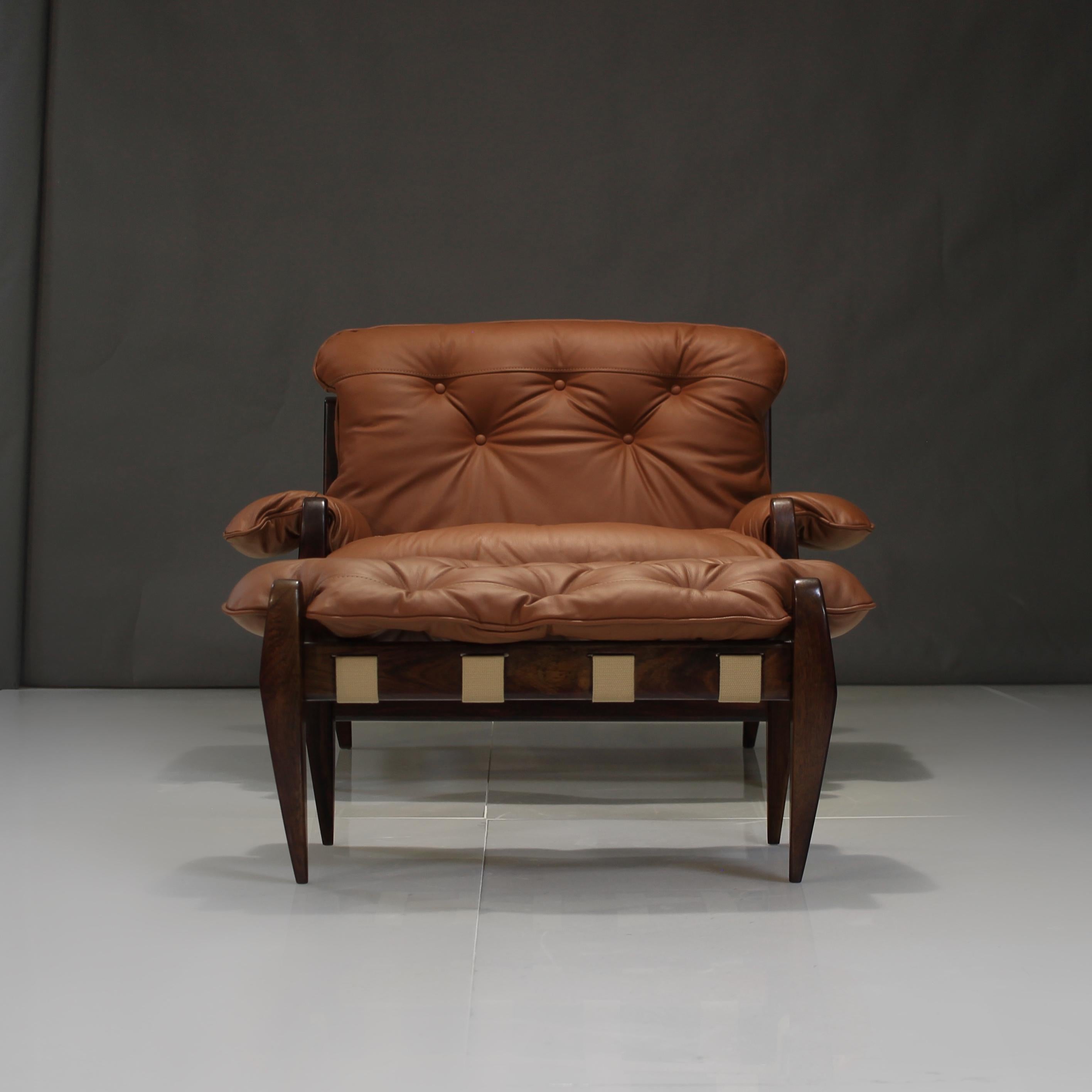 This is the kind of piece you can build a room around.

Named the ‘Rodeio’ Lounge Chair and Ottoman by Jean Gillon for Italma WoodArt of Brazil.

We chose to restore this in a rich caramel Italian Leather, contrasting beige stitching and matching